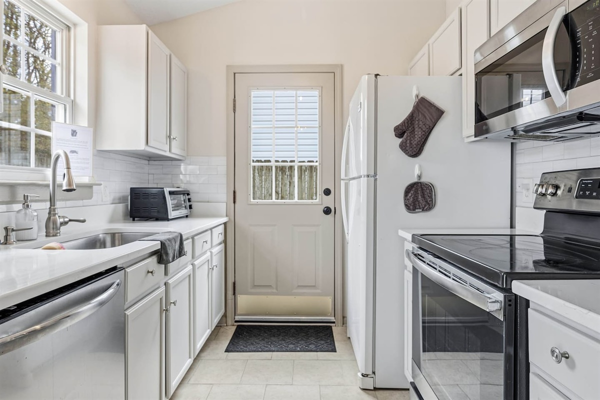 Fully stocked Kitchen with natural light