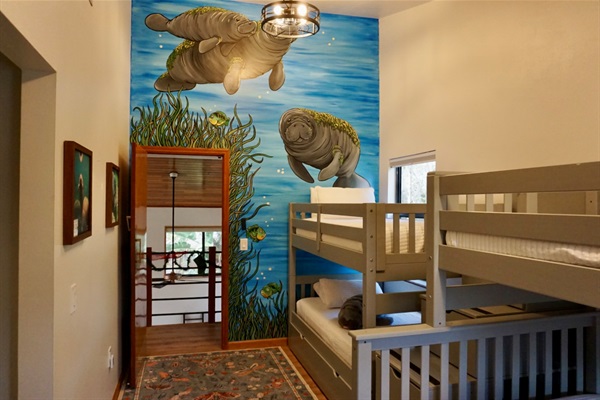Bunk Room with Manatee Mural from local Artist Gnarly Carly