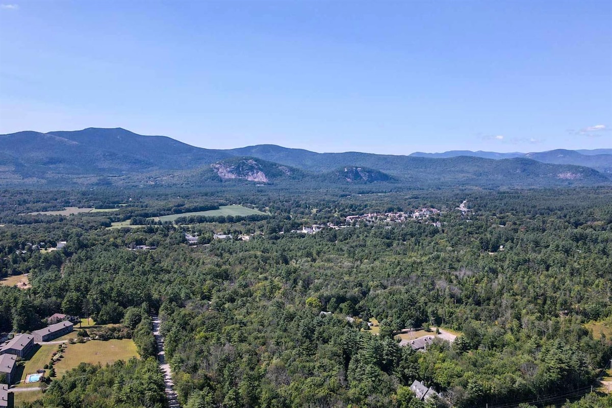 Drone shot from backyard showing how close downtown North Conway is