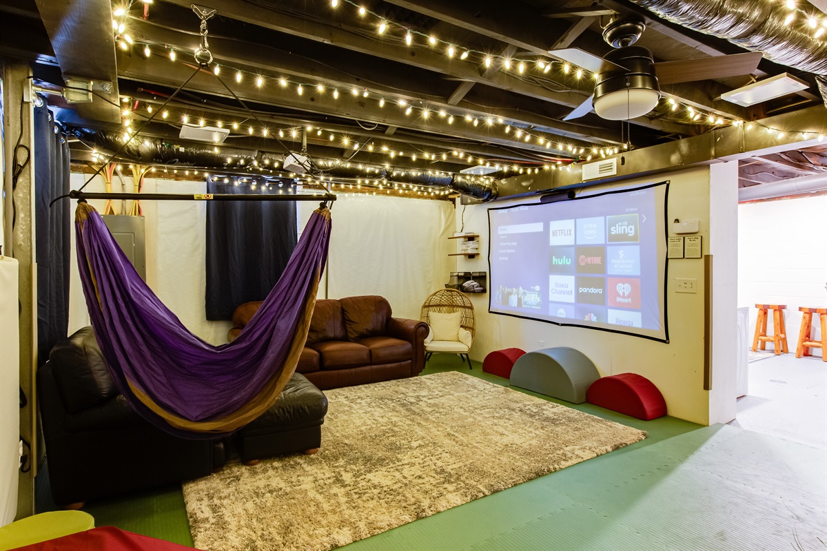 Basement: play room/theater room - projector is attached to a Roku and Wii so you can stream movies, tv shows or play video games!