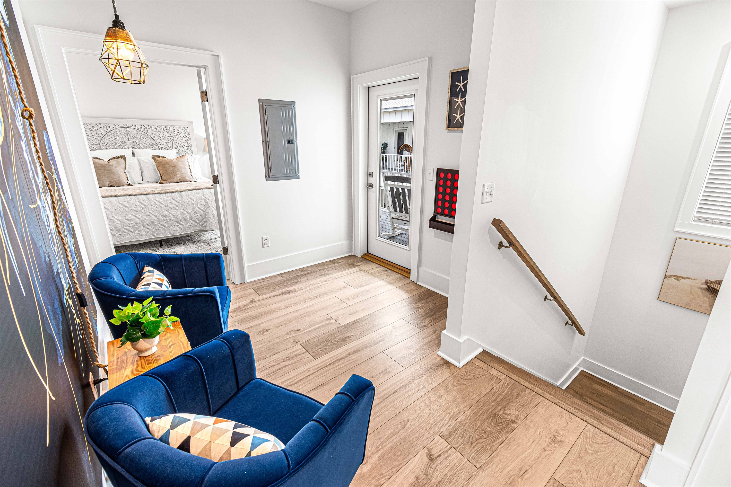 The upstairs landing is a great respite to get away from it all. Head out on the balcony, plug in the party lights and rest in the egg chair.