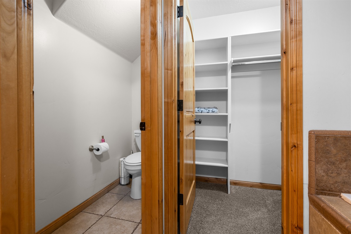 Plenty of storage for your personal items in the primary walk-in closet.