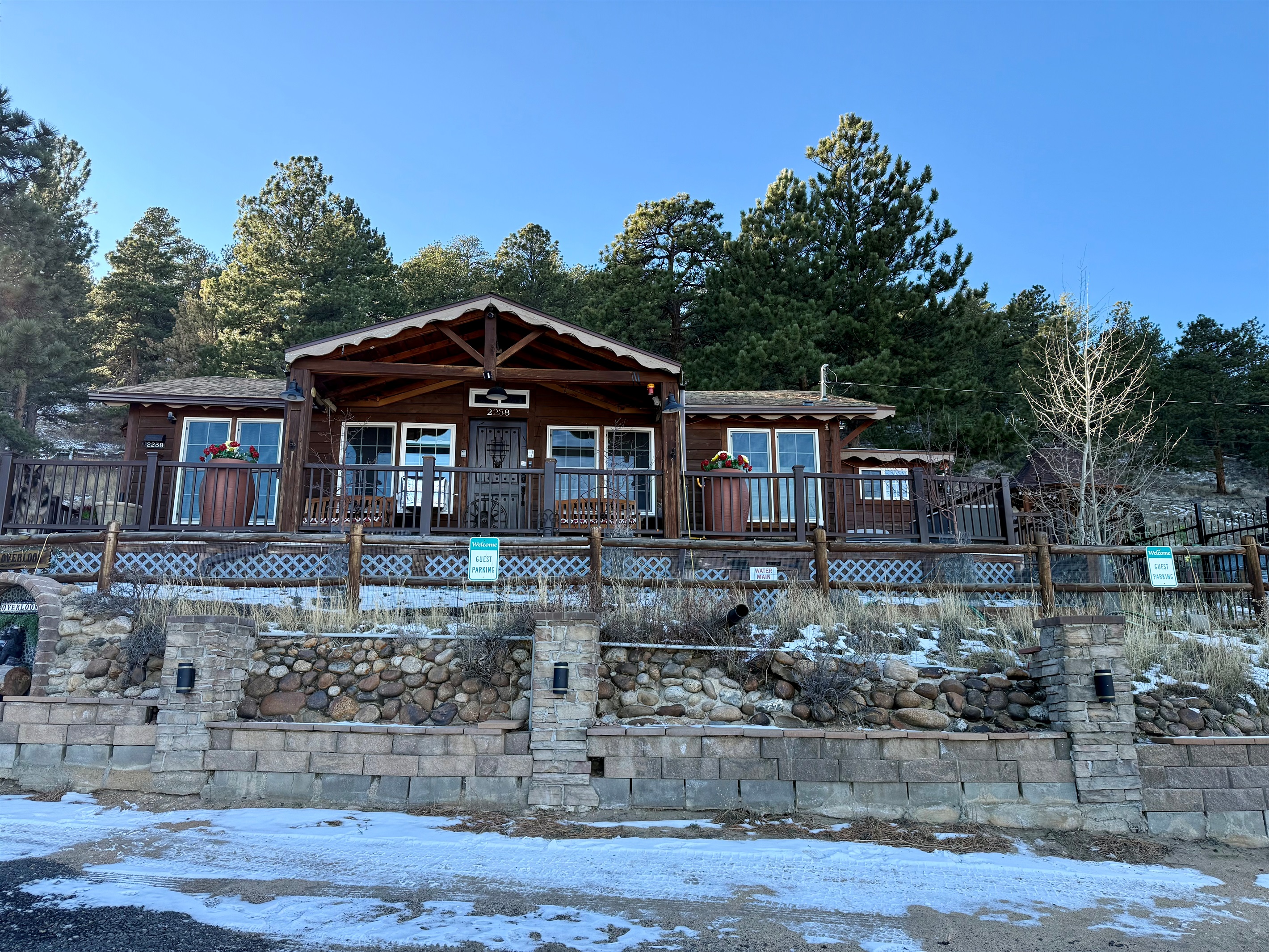 Rustic cabin charm with multiple outdoor spaces to relax, dine, and enjoy the mountain air.