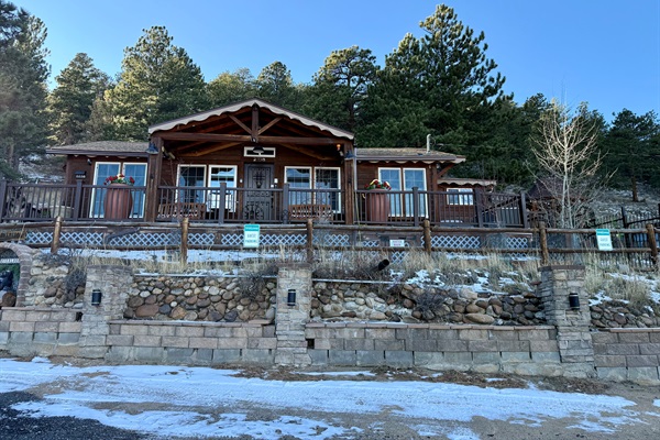 Rustic cabin charm with multiple outdoor spaces to relax, dine, and enjoy the mountain air.