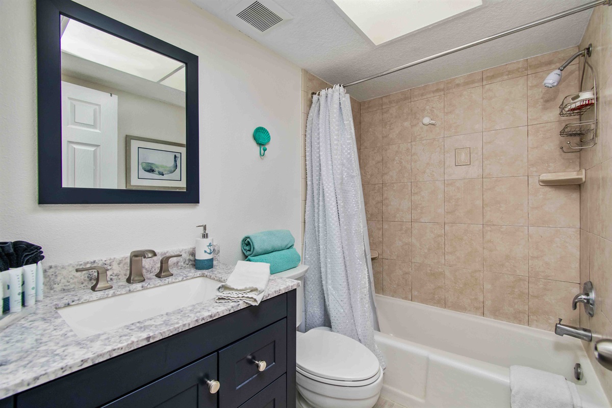 Full bath with tub and shower