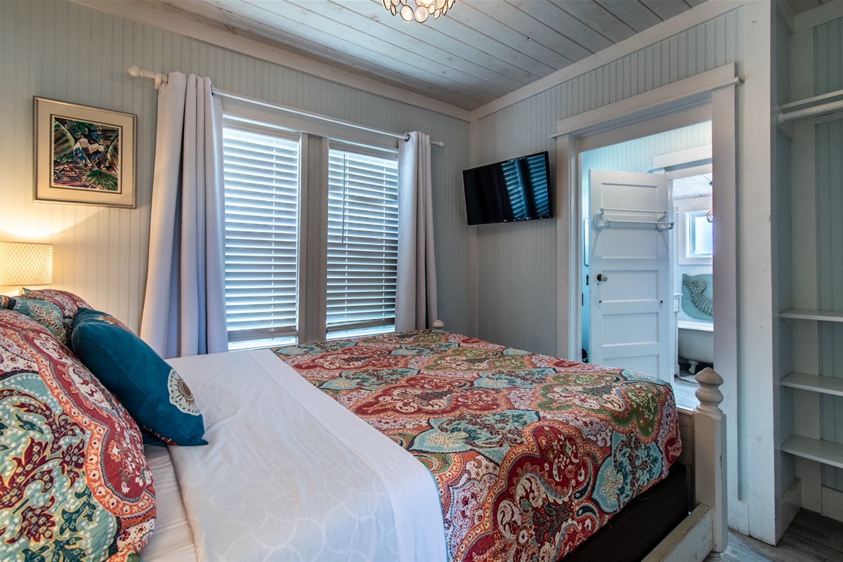 Queen side bed with sound machine and smart TV