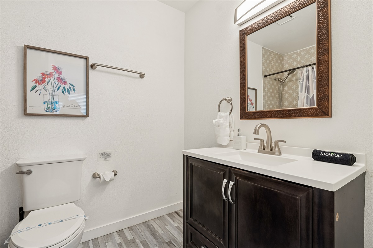 View of the vanity in the bathroom off the primary bedroom