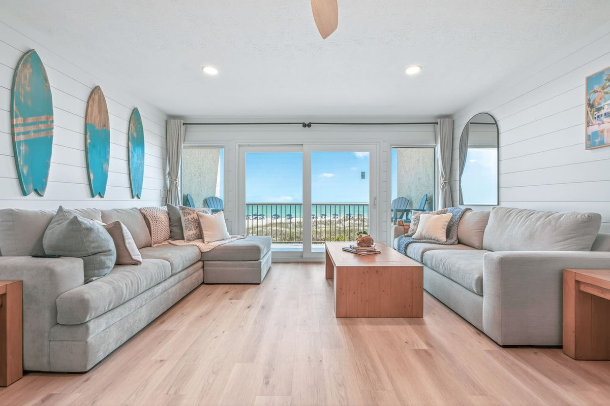 Gulf-view living room with two queen sleeper sofas and sliding doors to your private balcony.