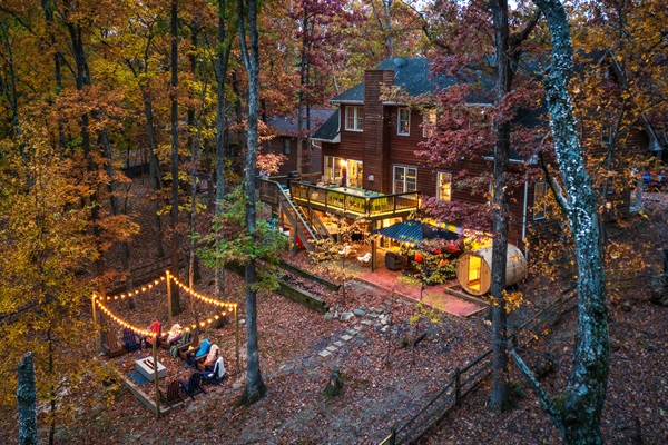 Where the memories happen — firepit nights, glowing lights, and the perfect mountain backdrop