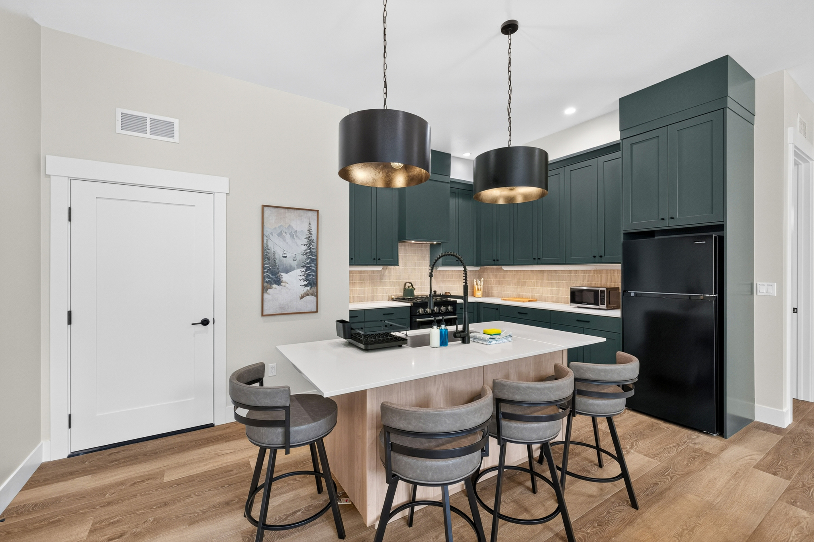 Enjoy and entertain in this modern, fully stocked kitchen.