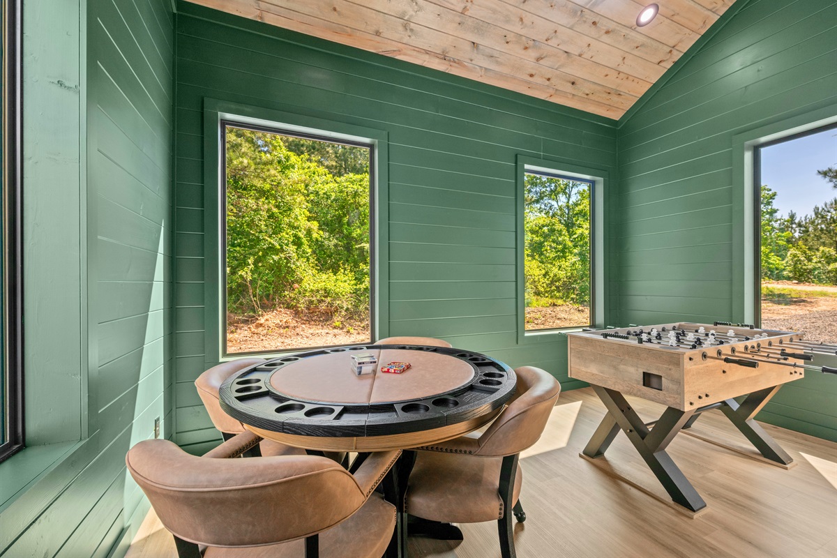 Challenge your group to a game night while enjoying peaceful wooded views from the surrounding windows.