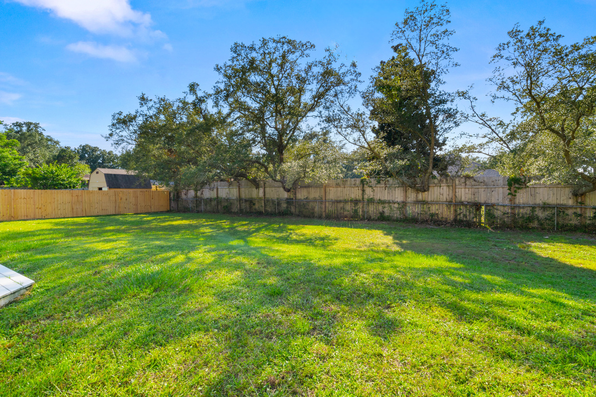 A private fenced backyard gives everyone a little extra room to enjoy the outdoors.