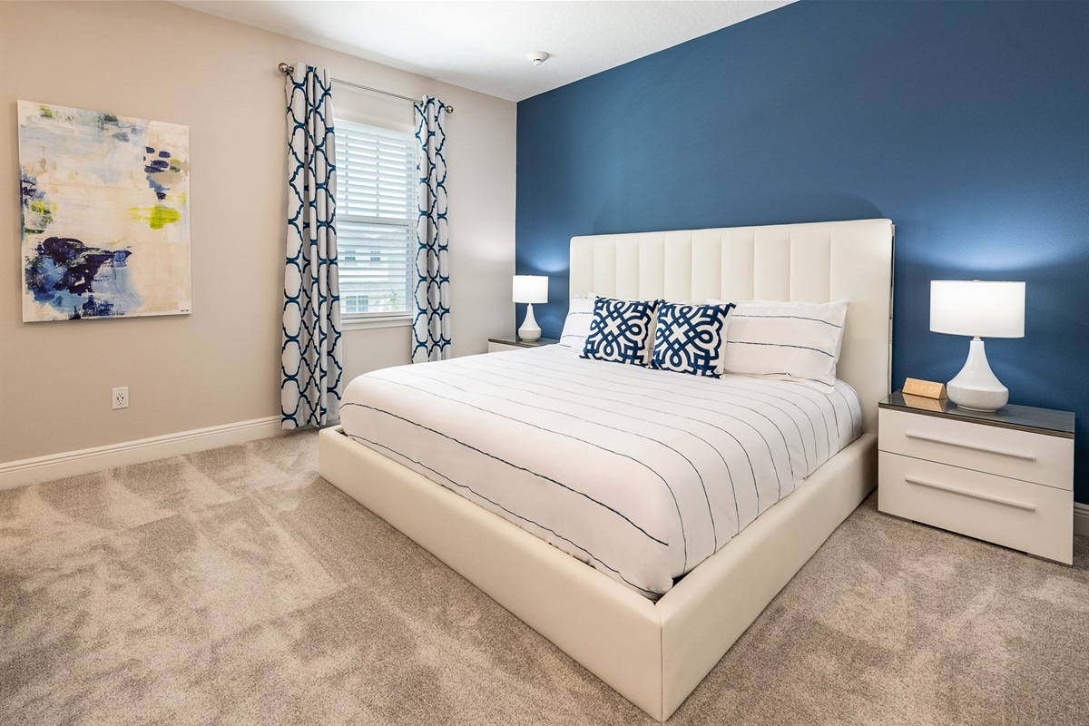 Perfect haven for restful nights and peaceful mornings in this King size master bedroom in second floor.