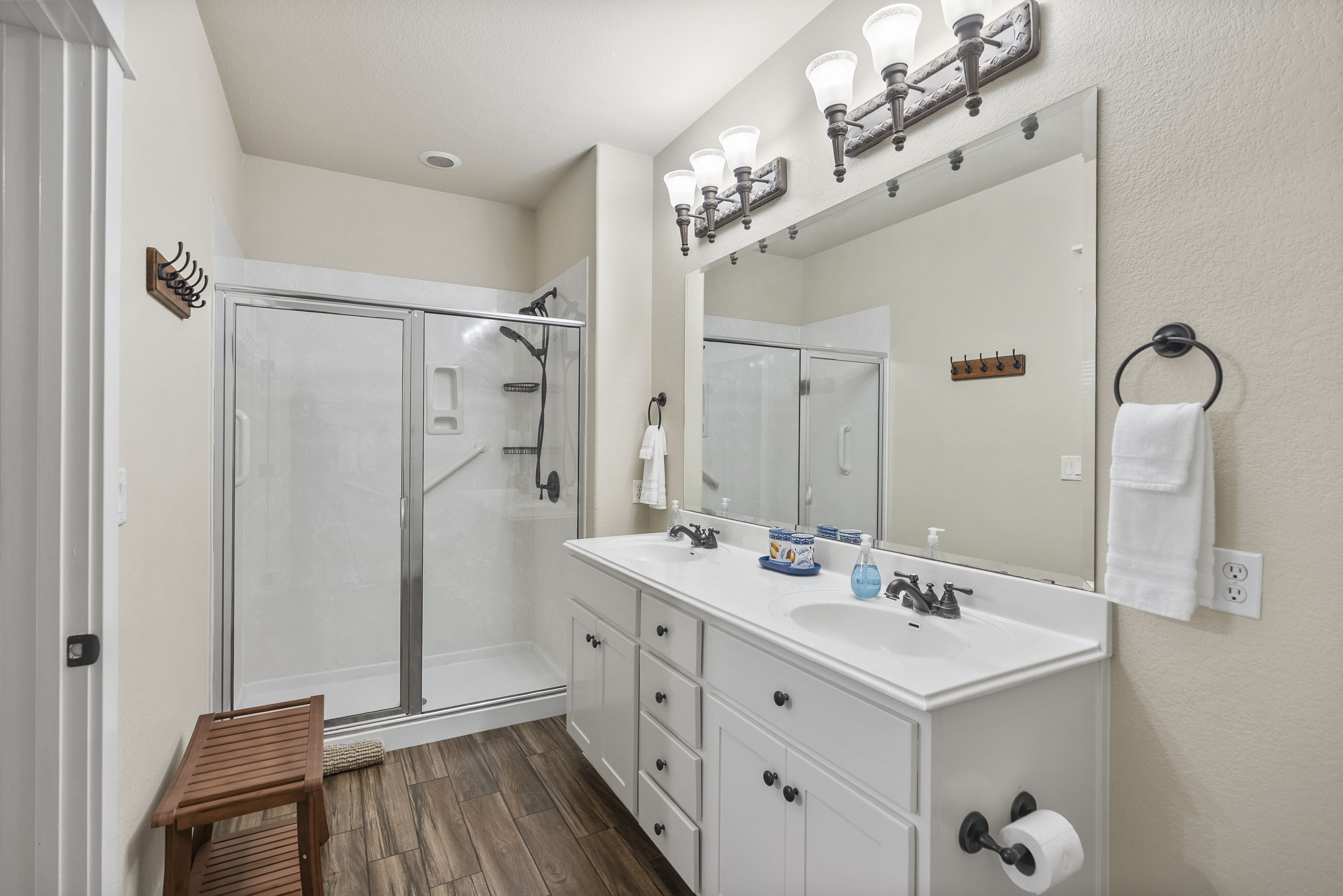 Private ensuite bathroom with a walk-in shower, grab bars, and accessibility features designed to provide additional support and ease of use.