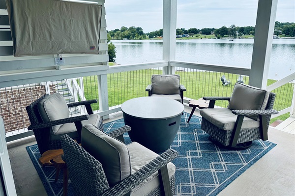 Comfortable lounging or watching the game overlooking the water on the first floor porch.