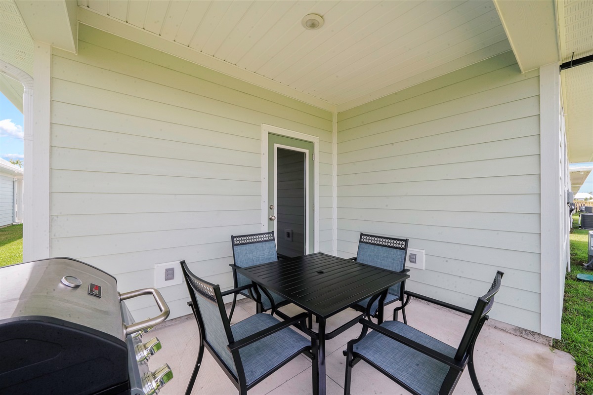 Spacious outdoor setting with Propane Grill, designed for dining, relaxing, and making memories with Friends/Family
