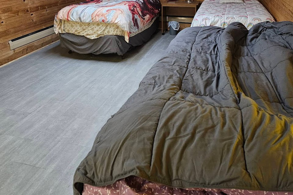 Two twin beds in basement bedroom