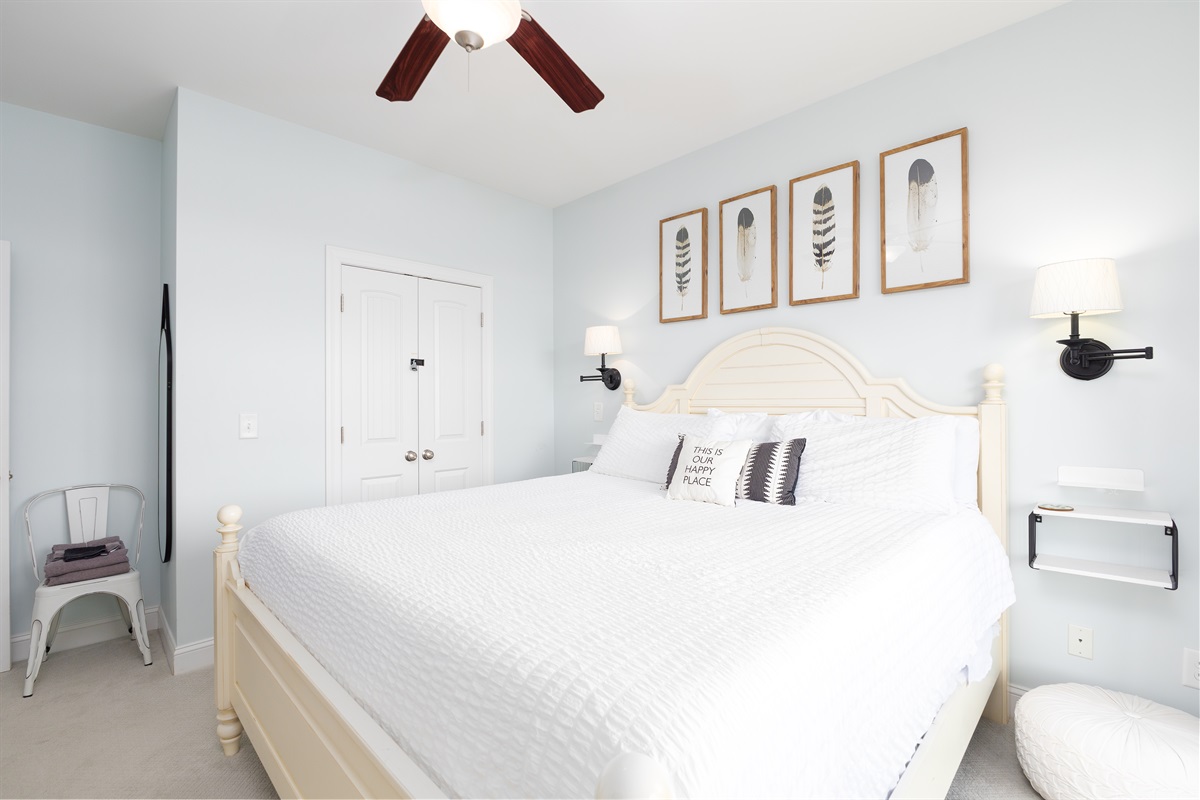 The master bedroom's design emphasizes a sense of calm and spaciousness