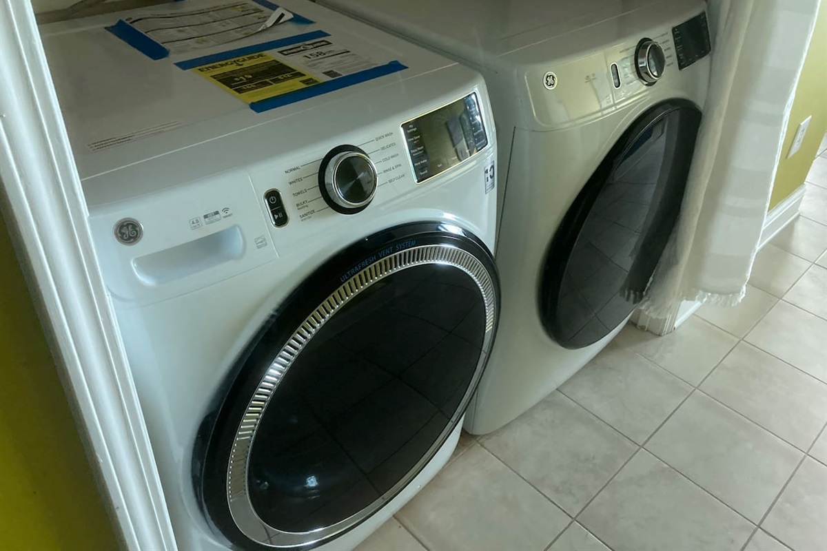 Over size washer and dryer in unit.