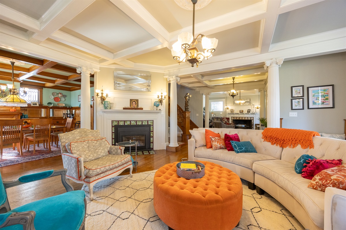 Spacious living room with a warm fireplace, perfect for relaxing.