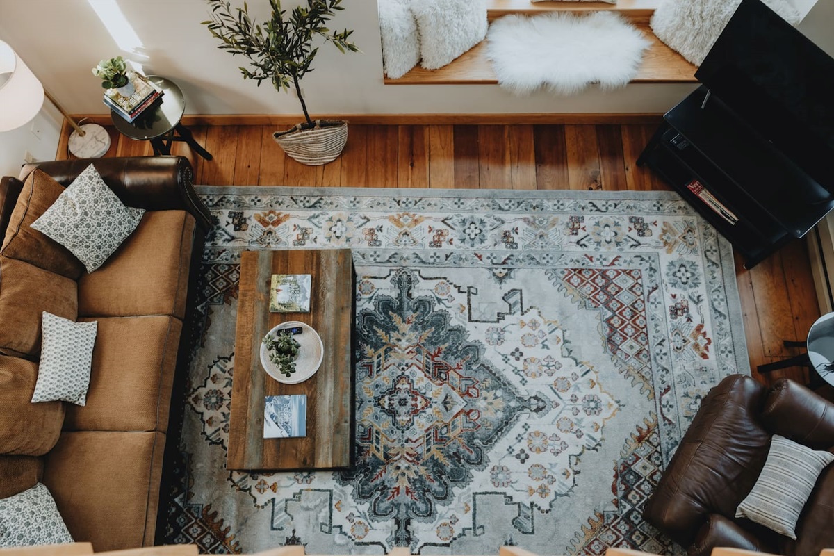 view of the living room from the third floor loft