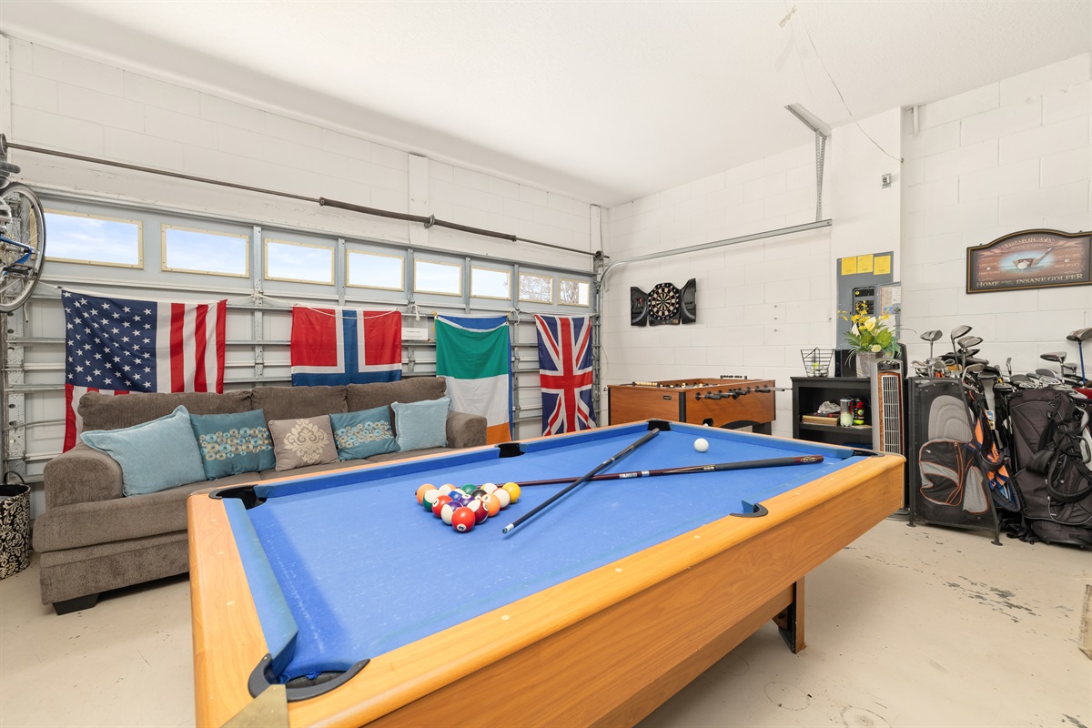 The game room has a pool table, foosball, air hockey and darts. There are six sets of golf clubs for guests to use including a lefty set! 