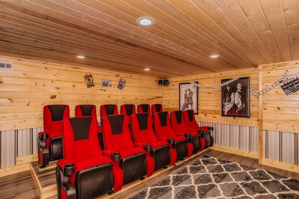 Movie theater with red cinema seats and surround sound, Splashing at the Bluff