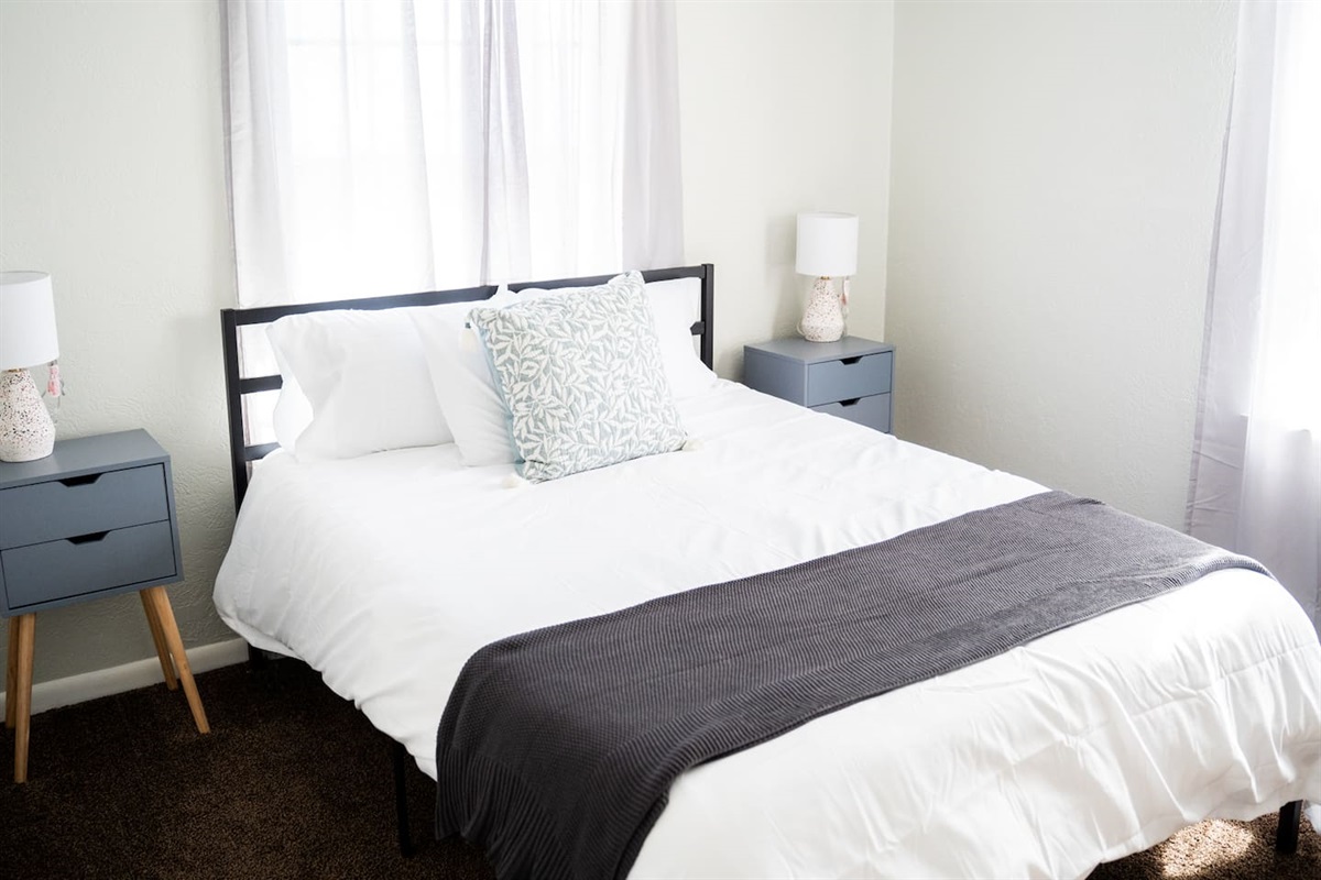 Secondary bedroom featuring a restful queen bed for a great night’s sleep.