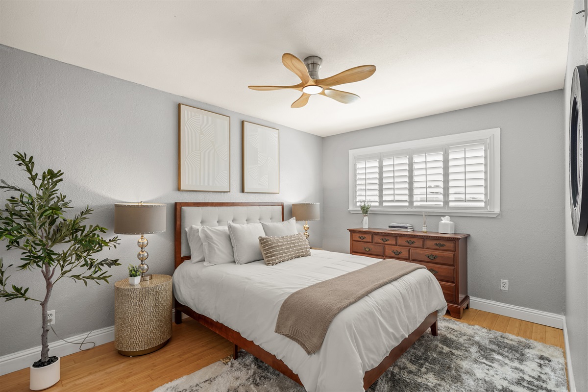 Cozy upstairs bedroom with a queen bed and relaxing atmosphere.