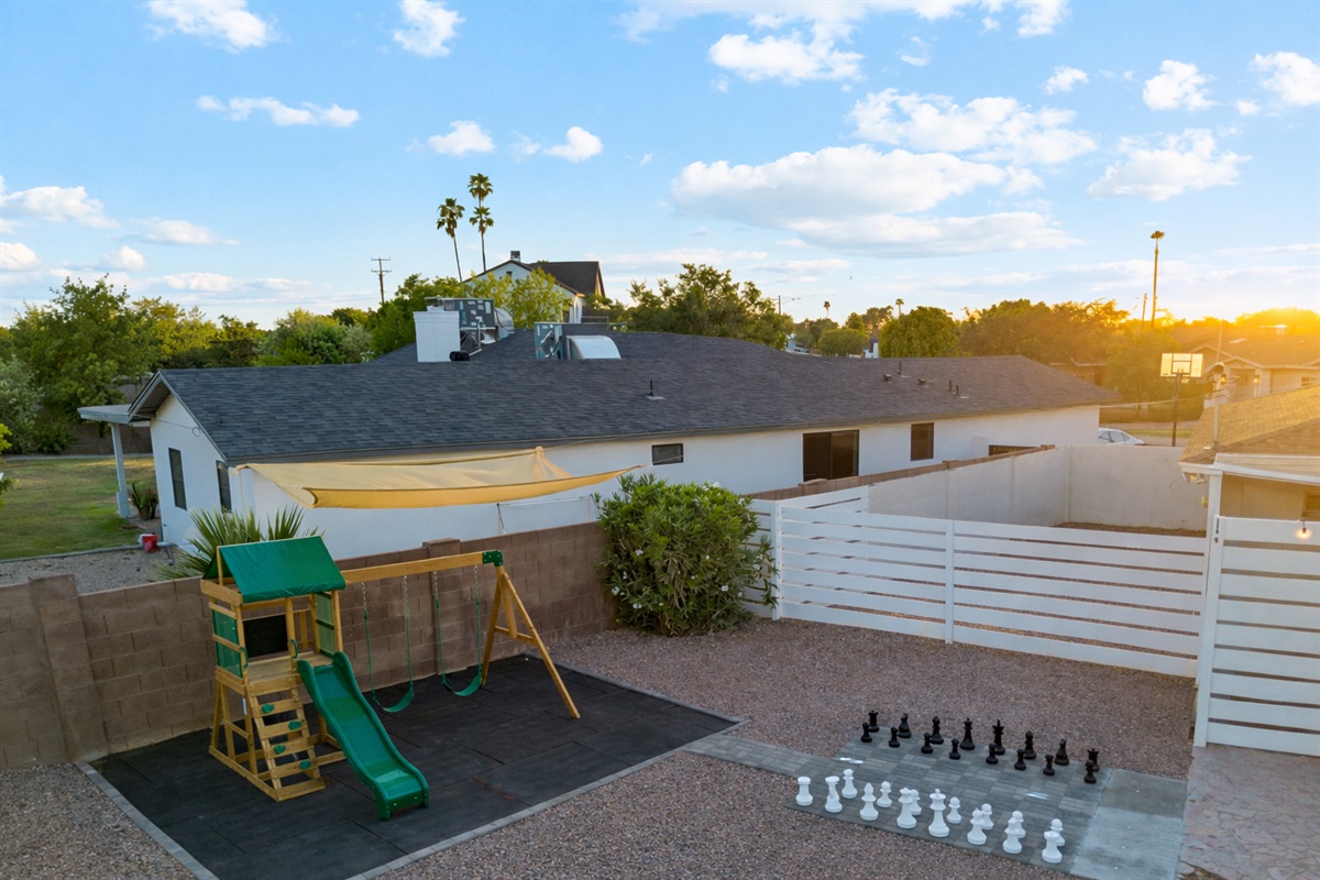 Enjoy life-size chess, a splashpad, and let the Kidd's play in this oasis yard shared with the 3 other units on the property.