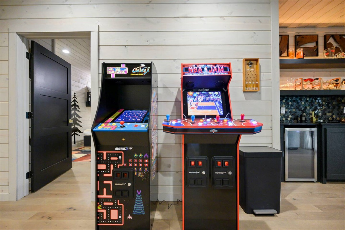 Ms. Pac Man/Galaga & NBA Jam (4 player version) are both tons of fun for kids and adults.  