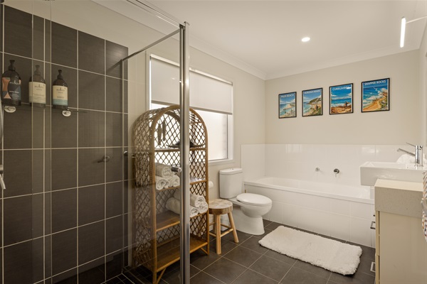 Large family bathroom with full-size bath shower and vanity.