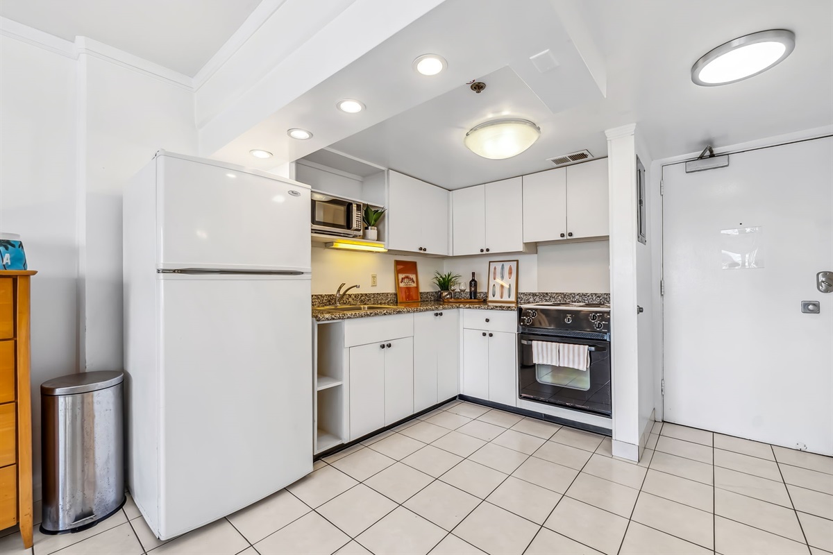 Convenient fully equipped kitchen to enjoy home cooking during your stay