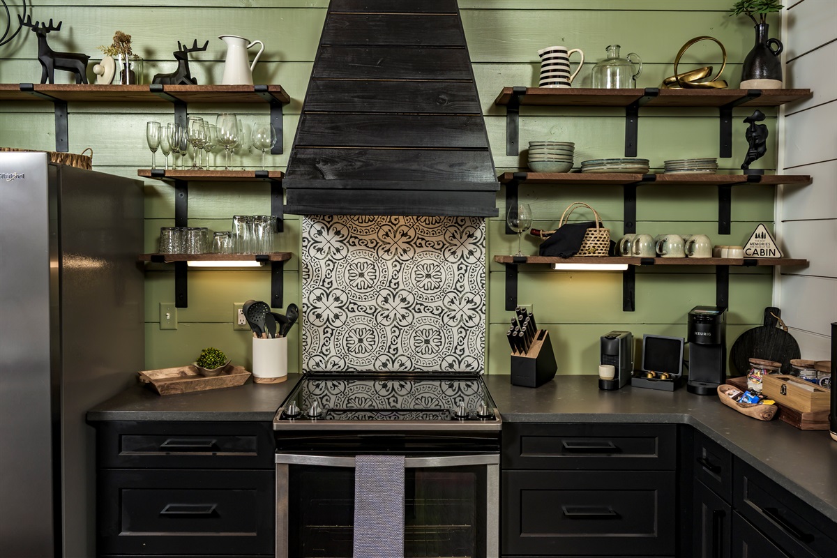 Stylish open-shelf kitchen with designer tile and everything you need for a perfect stay
