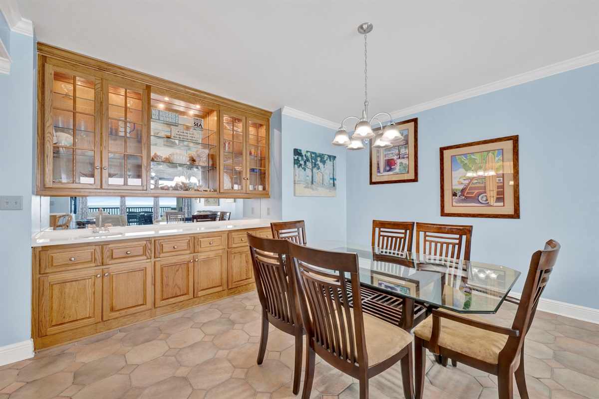 Dining area with a view! Has dining table and 6 chairs. Additional seating for 4 available at the bar area