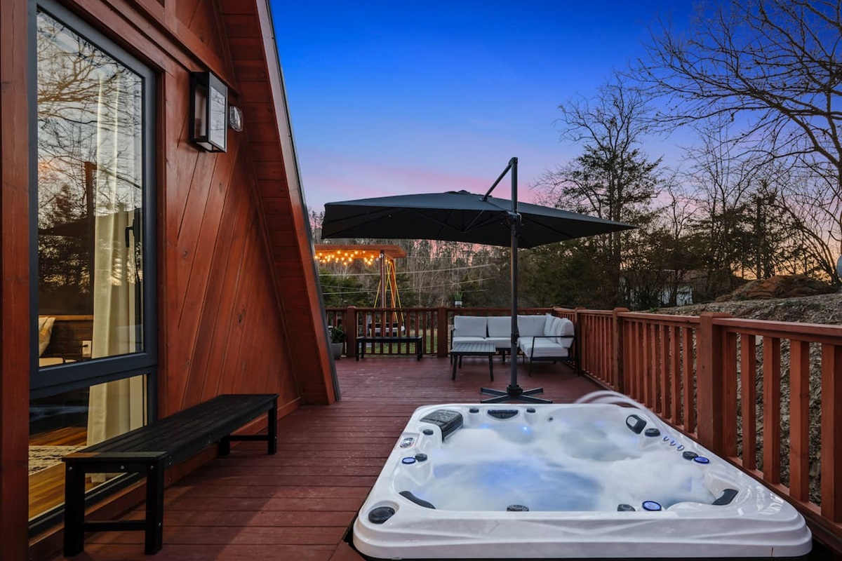 Soak under the stars in your private outdoor hot tub oasis.