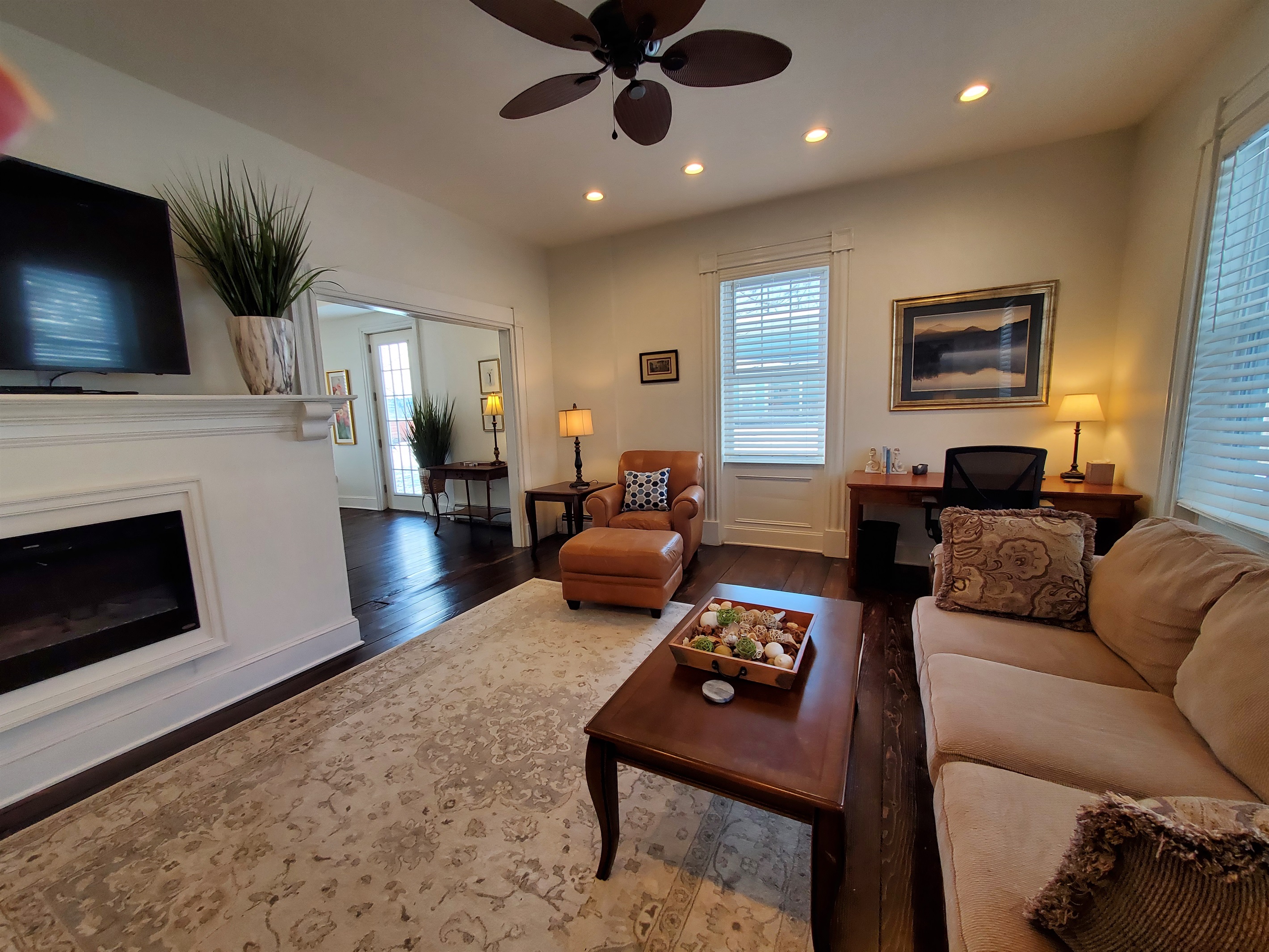 Woods Hollow welcomes you with spacious living room and gas fireplace