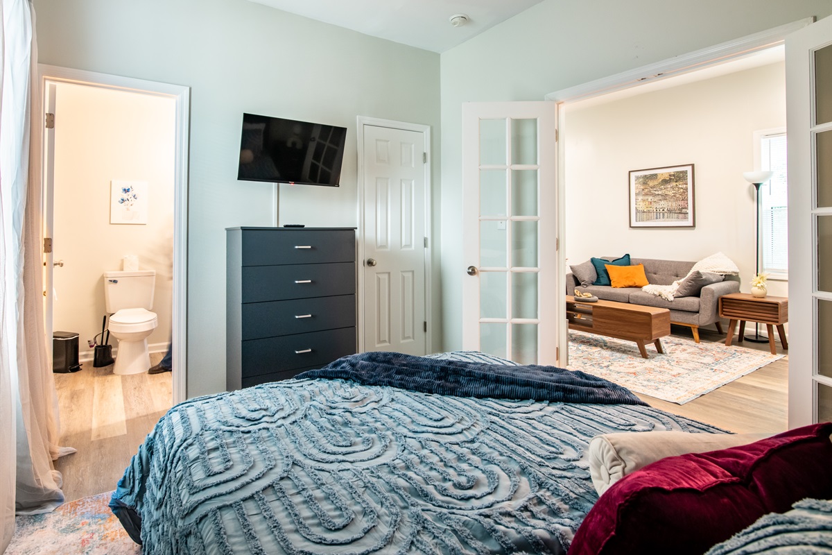 Spacious bedroom with a smart TV for effortless relaxation.
