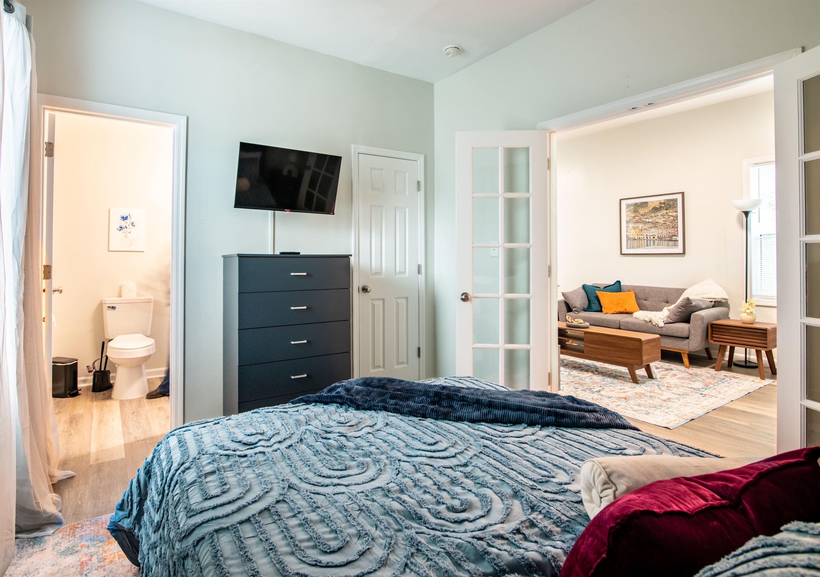 Spacious bedroom with a smart TV for effortless relaxation.