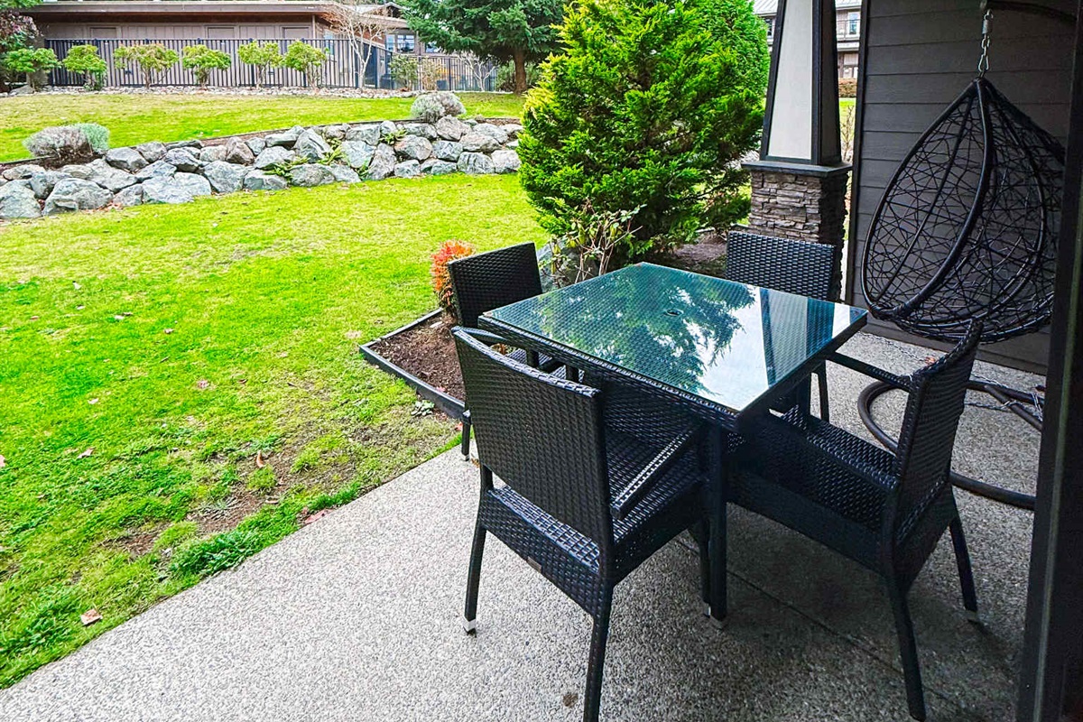 Covered Patio. BBQ Steps to pool. Backing on to tons of green space.
