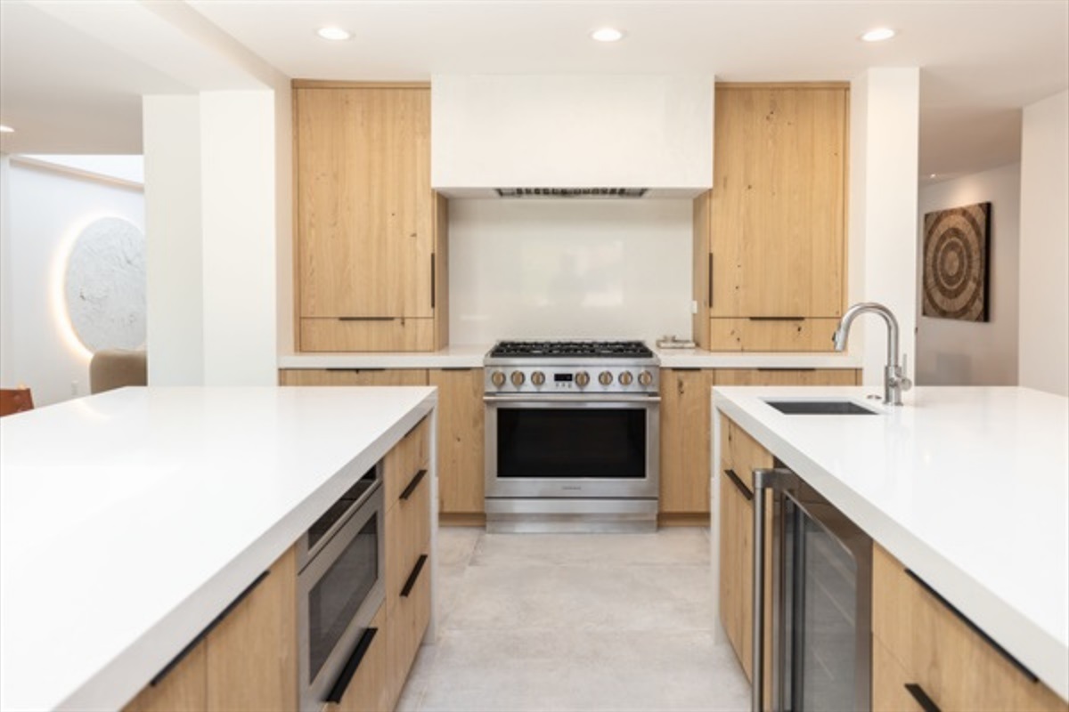 Gourmet kitchen with upscale appliances and two large islands.