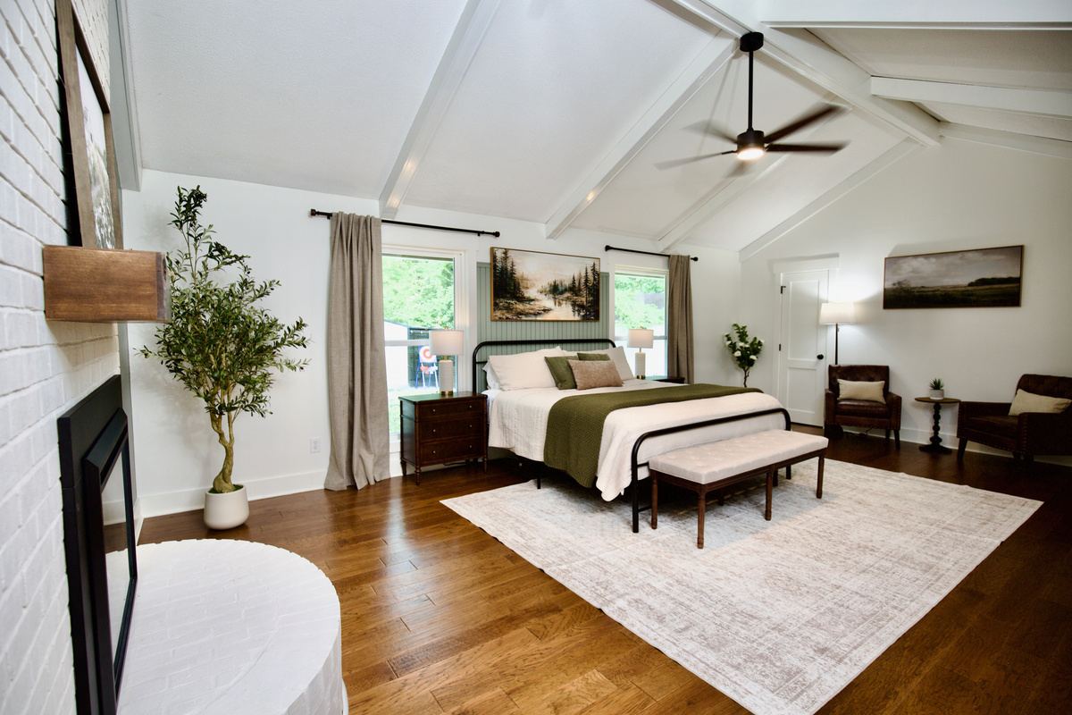 Unwind and retreat to the primary bedroom. 