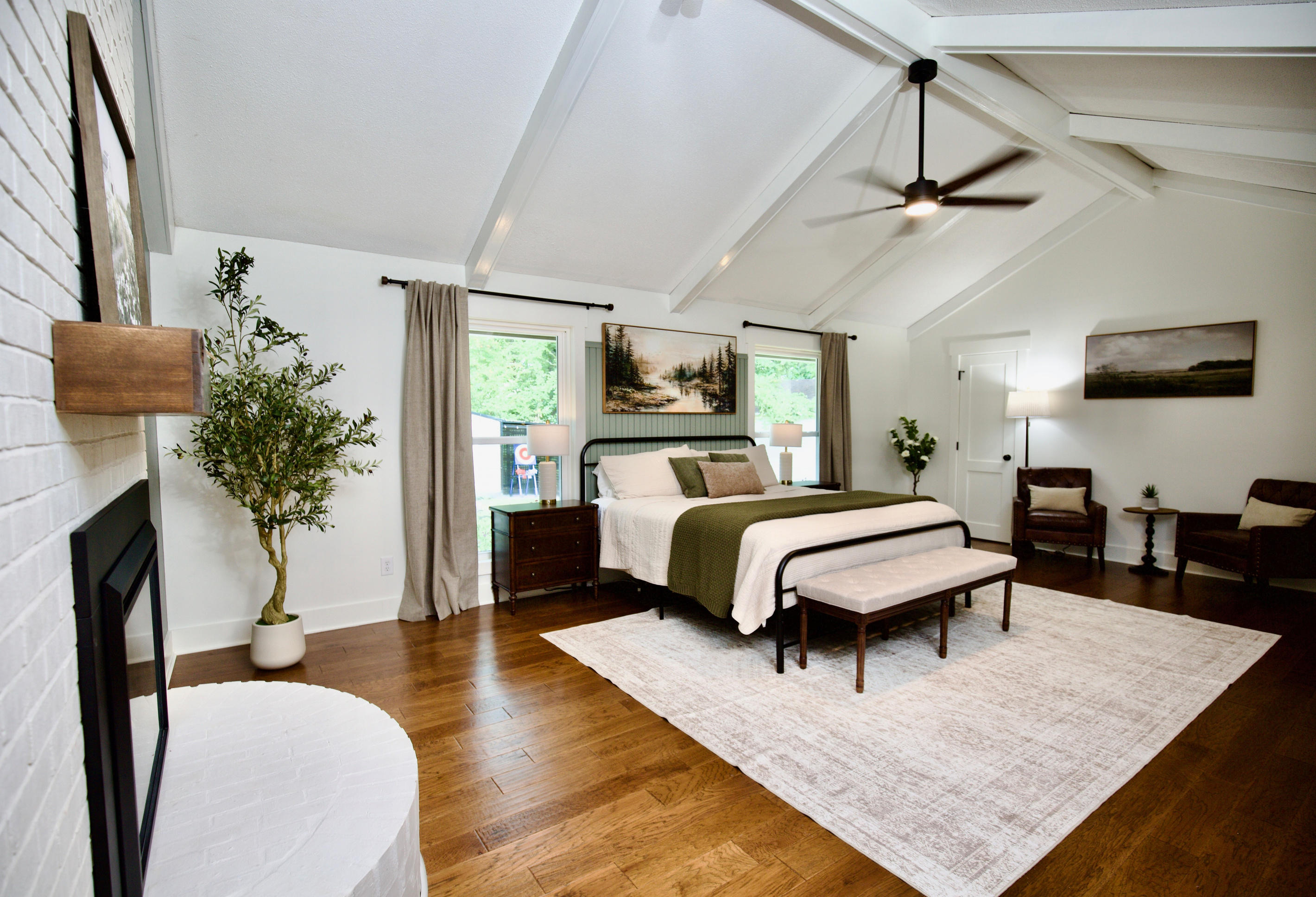 Unwind and retreat to the primary bedroom. 