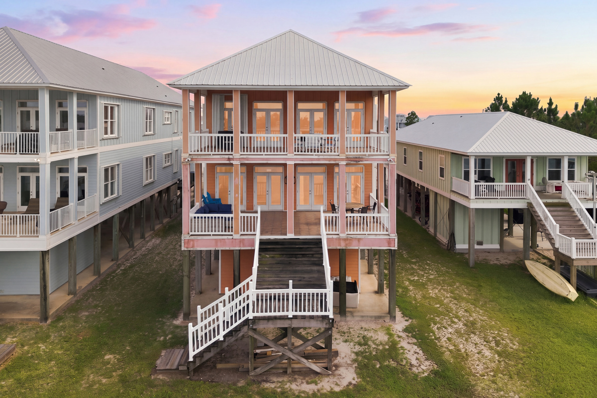 Elevated coastal home perched over Little Lagoon in Gulf Shores