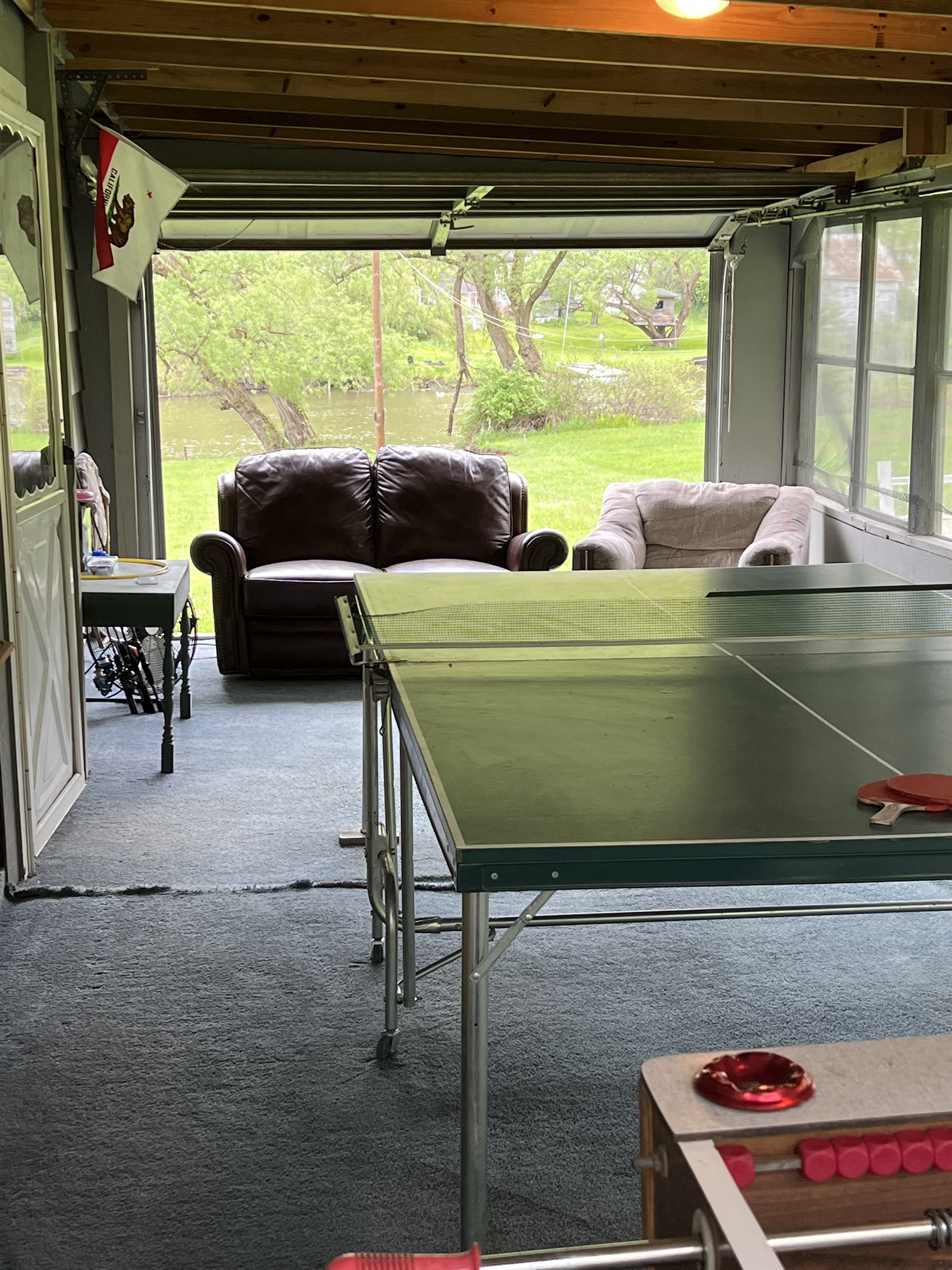 Screened in gameroom w/ water view