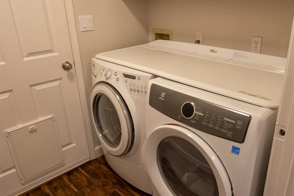 Laundry area with washer and dryer for added convenience during your stay.