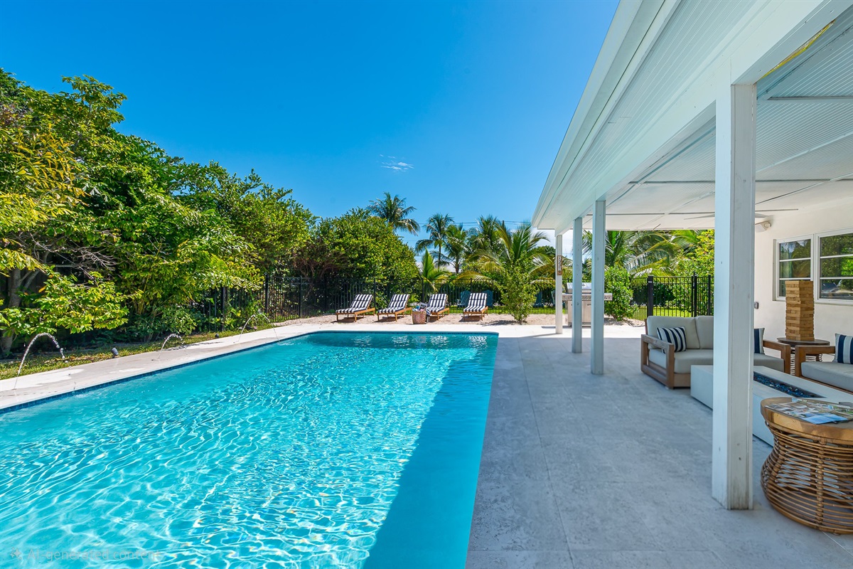 Heated saltwater pool with deck jets and color-changing LED lights. Perfect spot to soak up the sunshine and take a dip any time of day.
