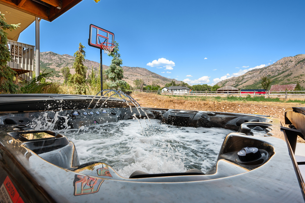 Relax in the private hot tub while taking in beautiful mountain views, or enjoy a friendly game of basketball just steps away.