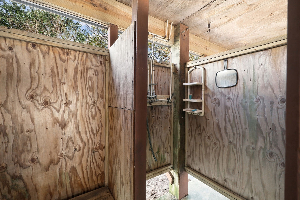 Rinse off the sand in the enclosed outdoor shower. An Outer Banks must!