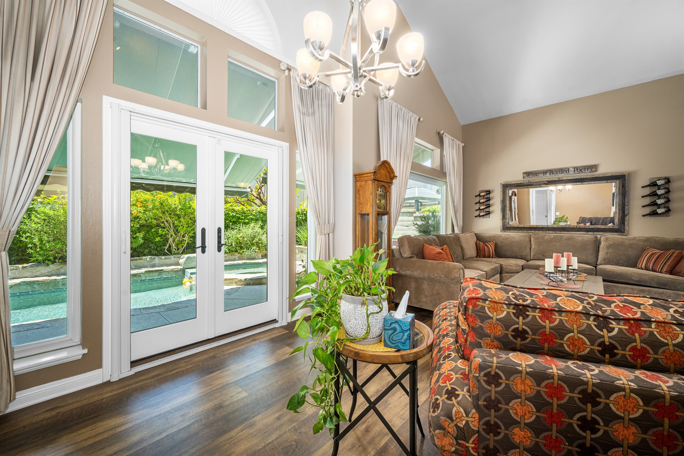 Living Room, French Doors exit to the Backyard.